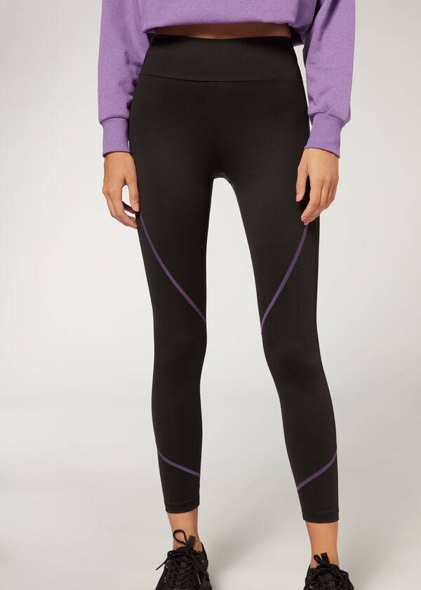 leggings deportivos de alto rendimiento calzedonia con costuras en contraste para mujer color negro y morado
