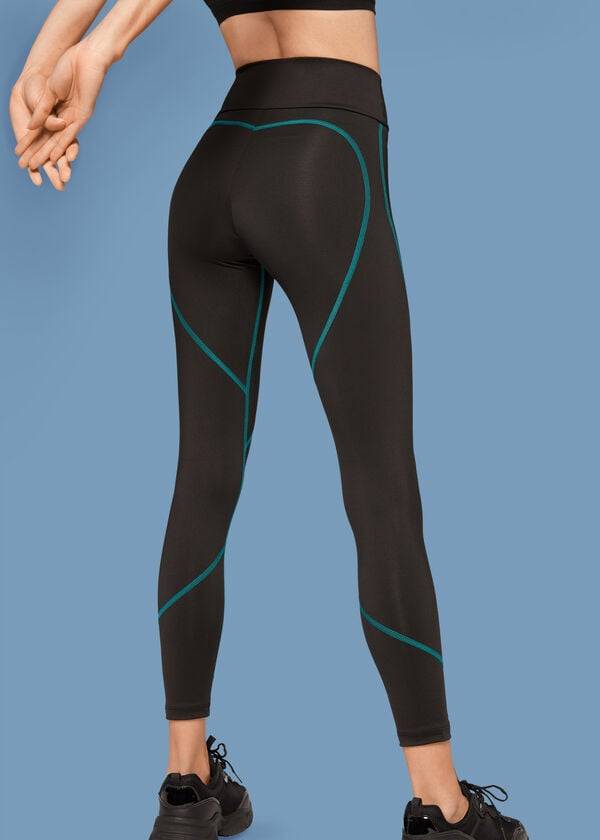 leggings deportivos de alto rendimiento calzedonia con costuras en contraste para mujer color negro y verde