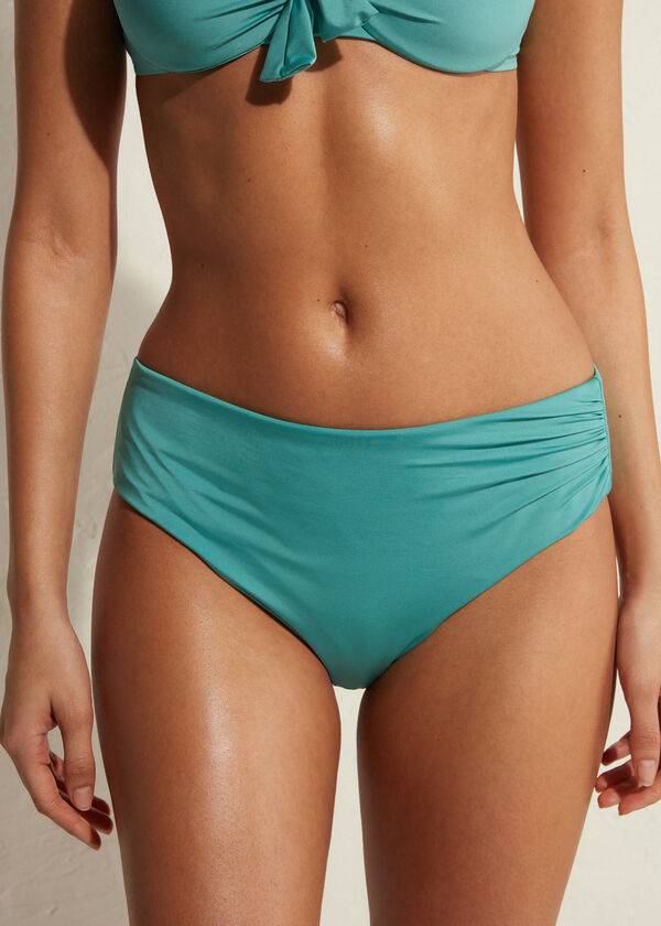 braguita de bikini ecológica de cintura alta color turquesa de calzedonia para mujer
