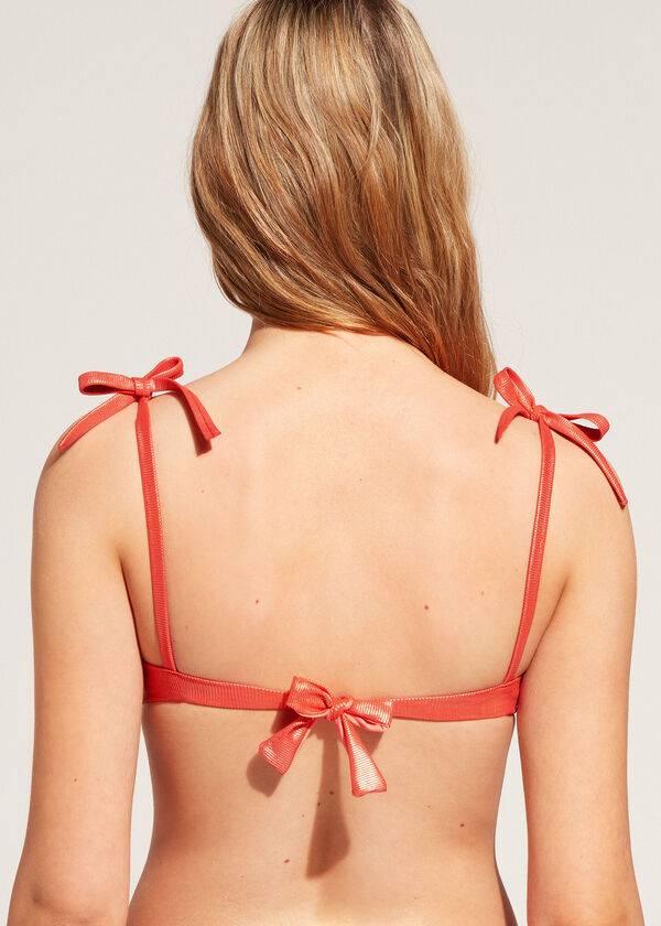 bikini de mujer calzedonia con push-up acolchado y graduado color coral y naranja